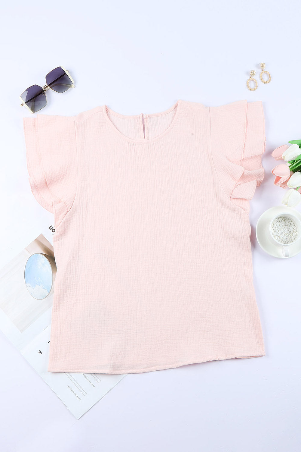 Blusa de manga corta con volantes escalonados y textura rosa