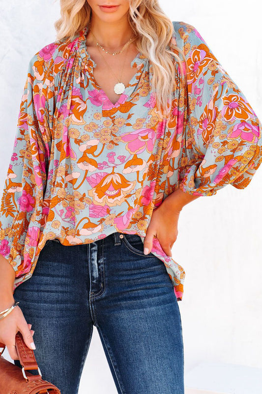 Blusa holgada con cuello en V y pliegues con estampado floral azul cielo