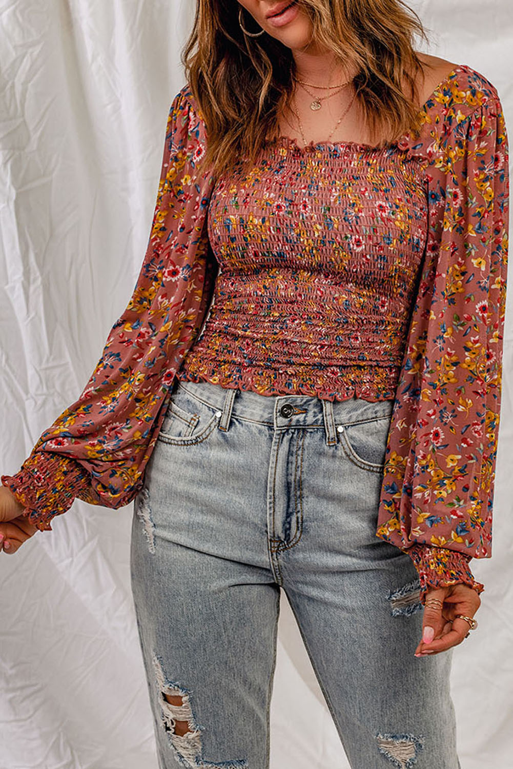 Blusa floral con mangas farol fruncidas