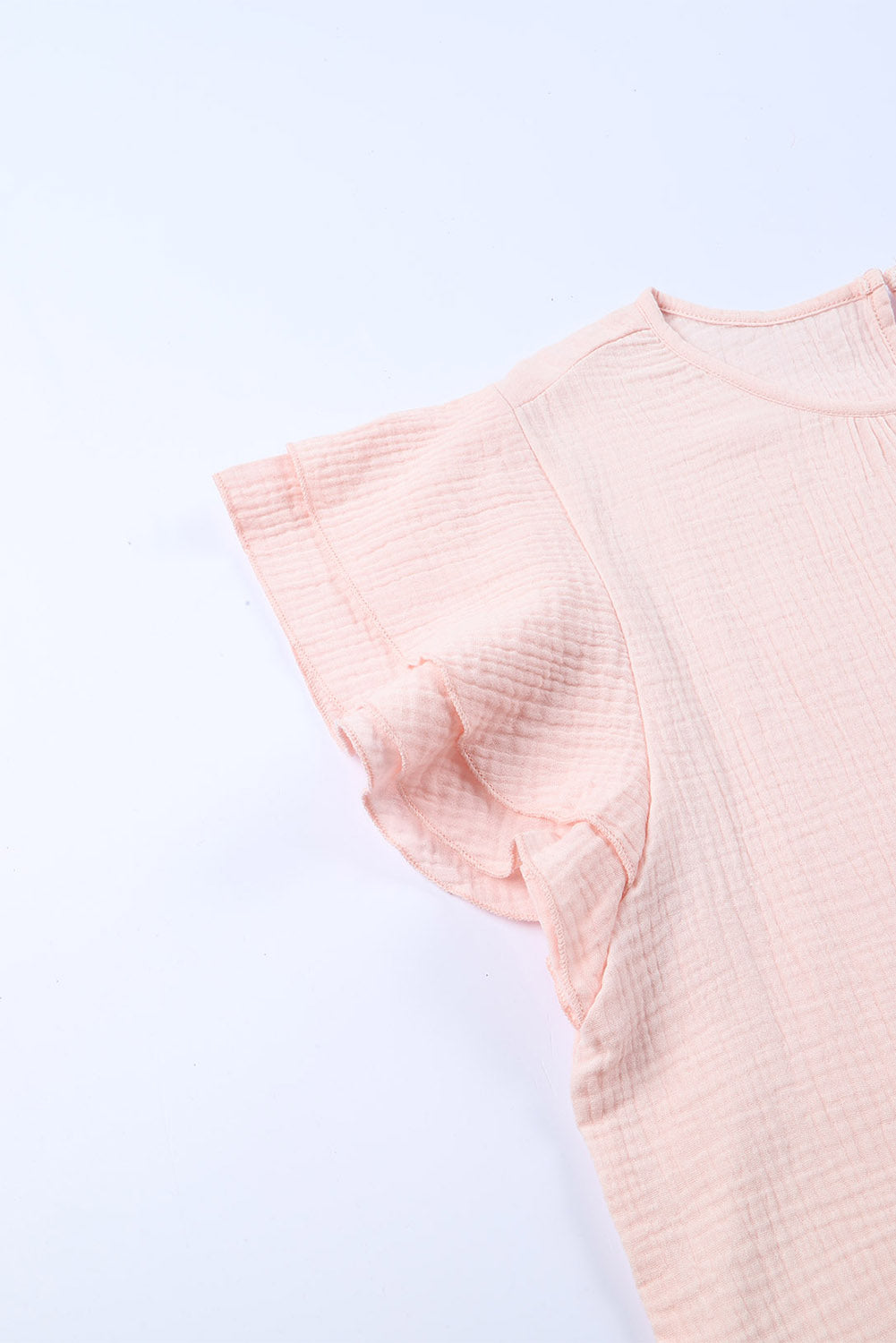 Blusa de manga corta con volantes escalonados y textura rosa