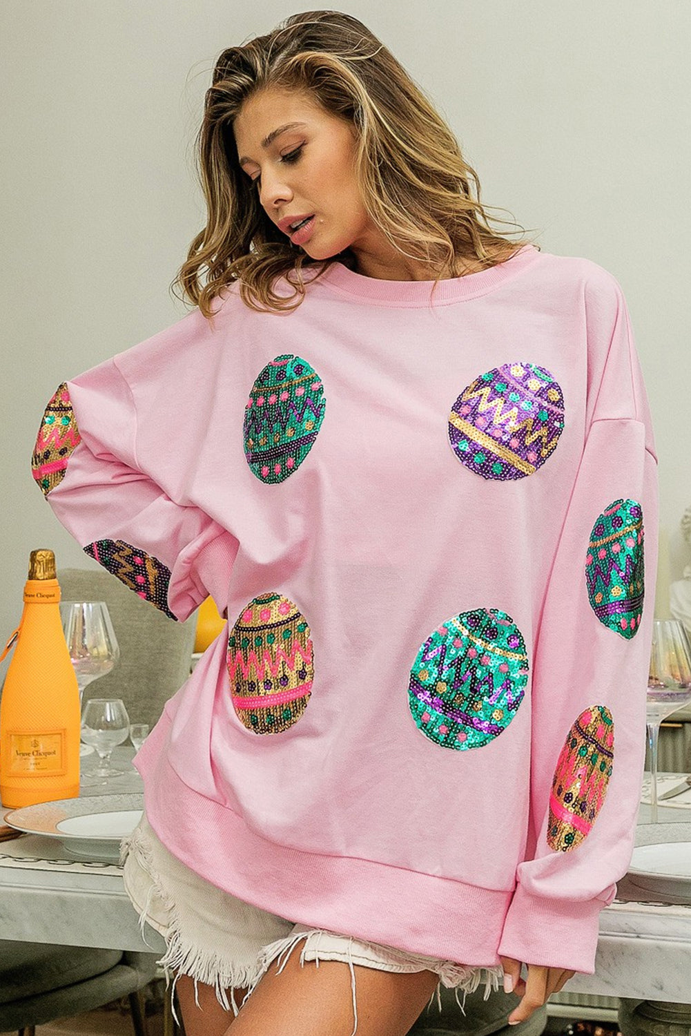 Sudadera extragrande con hombros caídos y huevos de Pascua con lentejuelas rosa