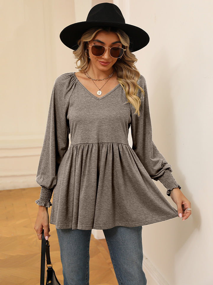 Blusa con mangas farol y cuello en V