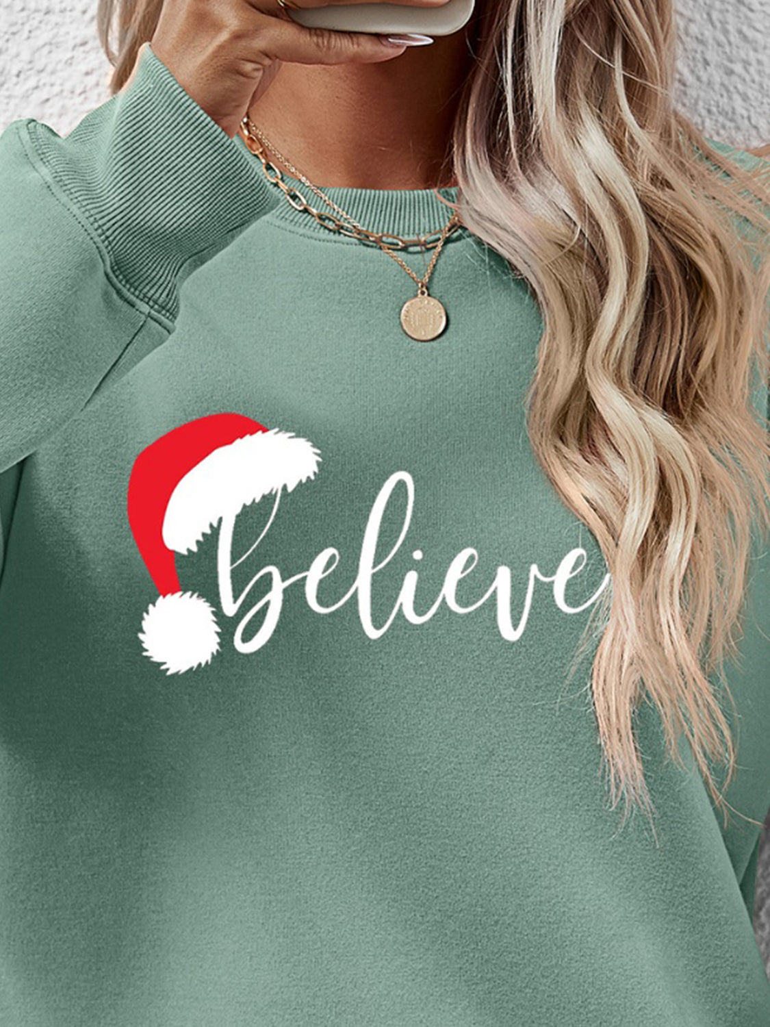 Sudadera de manga larga con gráfico BELIEVE