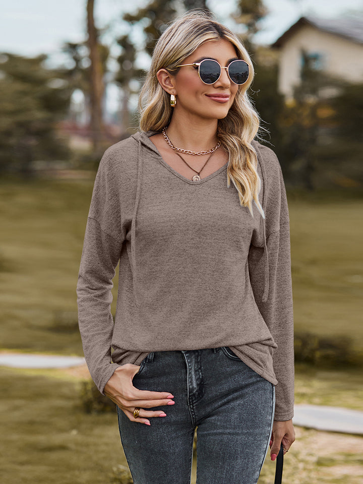 Blusa con capucha y hombros caídos