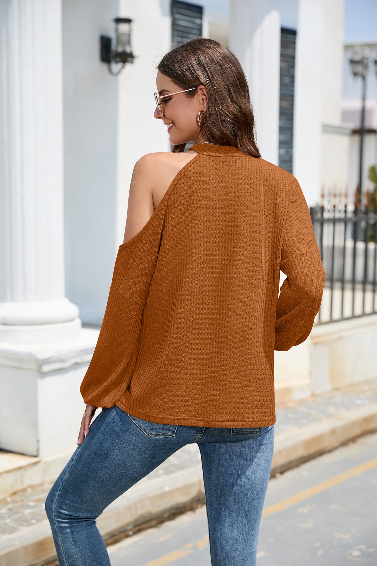 Blusa asimétrica de punto tipo gofre con mangas farol