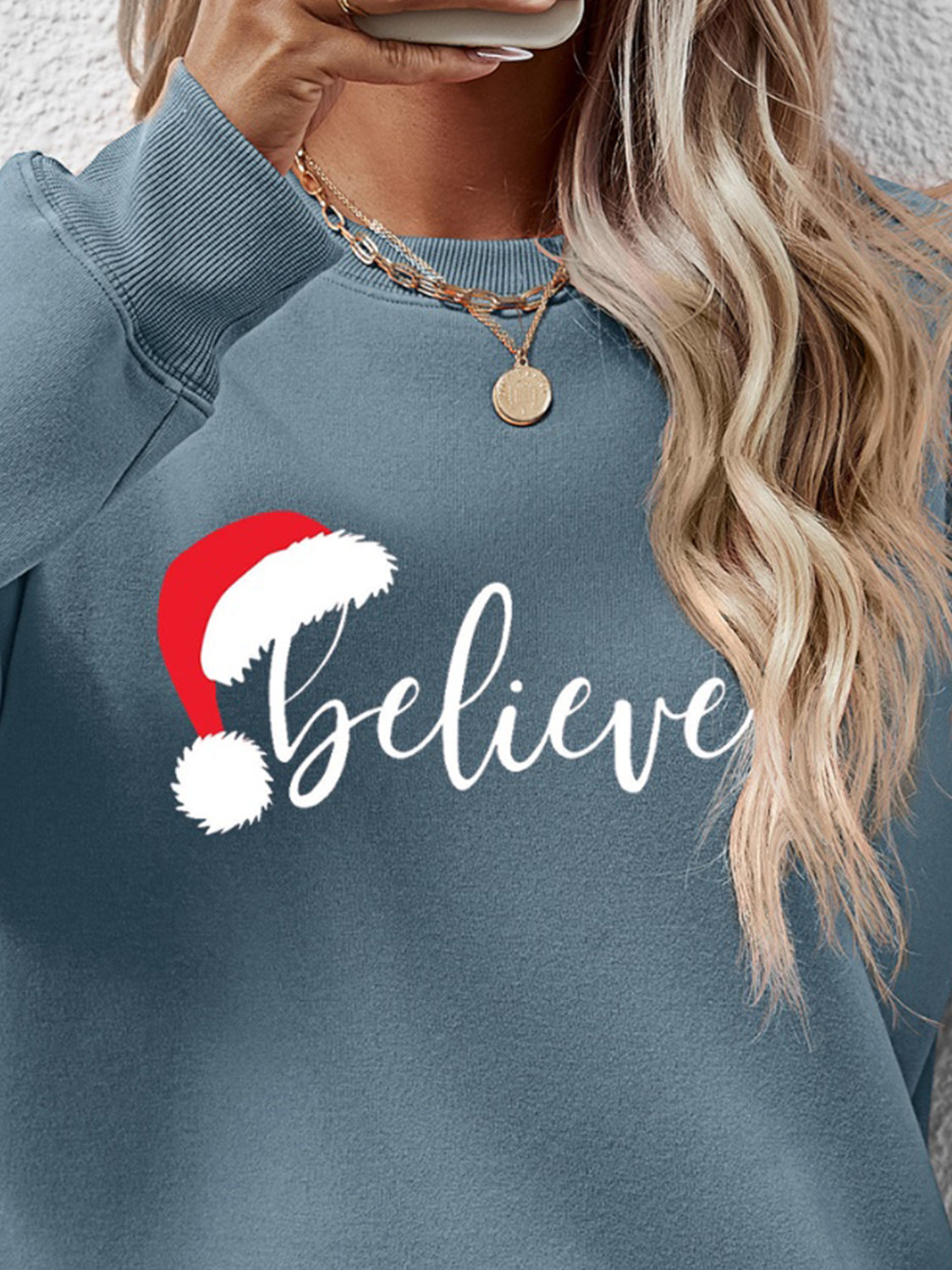 Sudadera de manga larga con gráfico BELIEVE