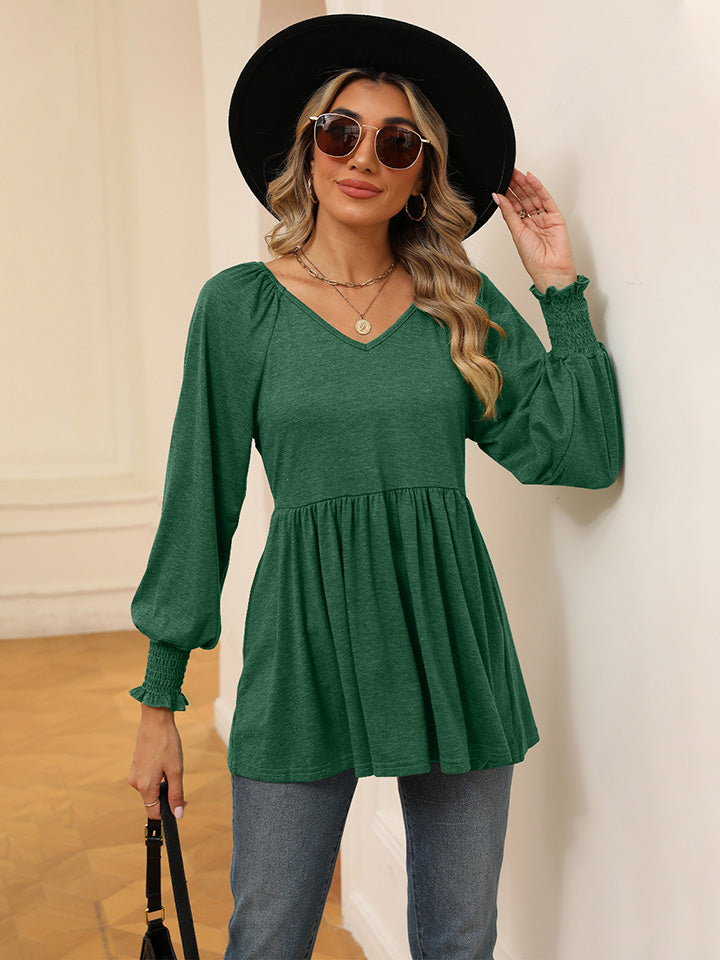 Blusa con mangas farol y cuello en V