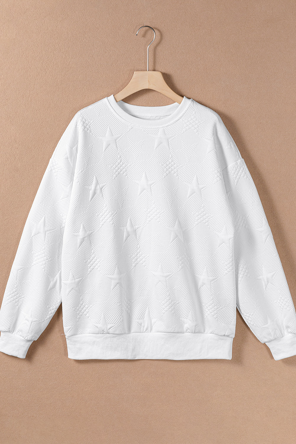 Sudadera con hombros caídos y textura en relieve de estrella blanca