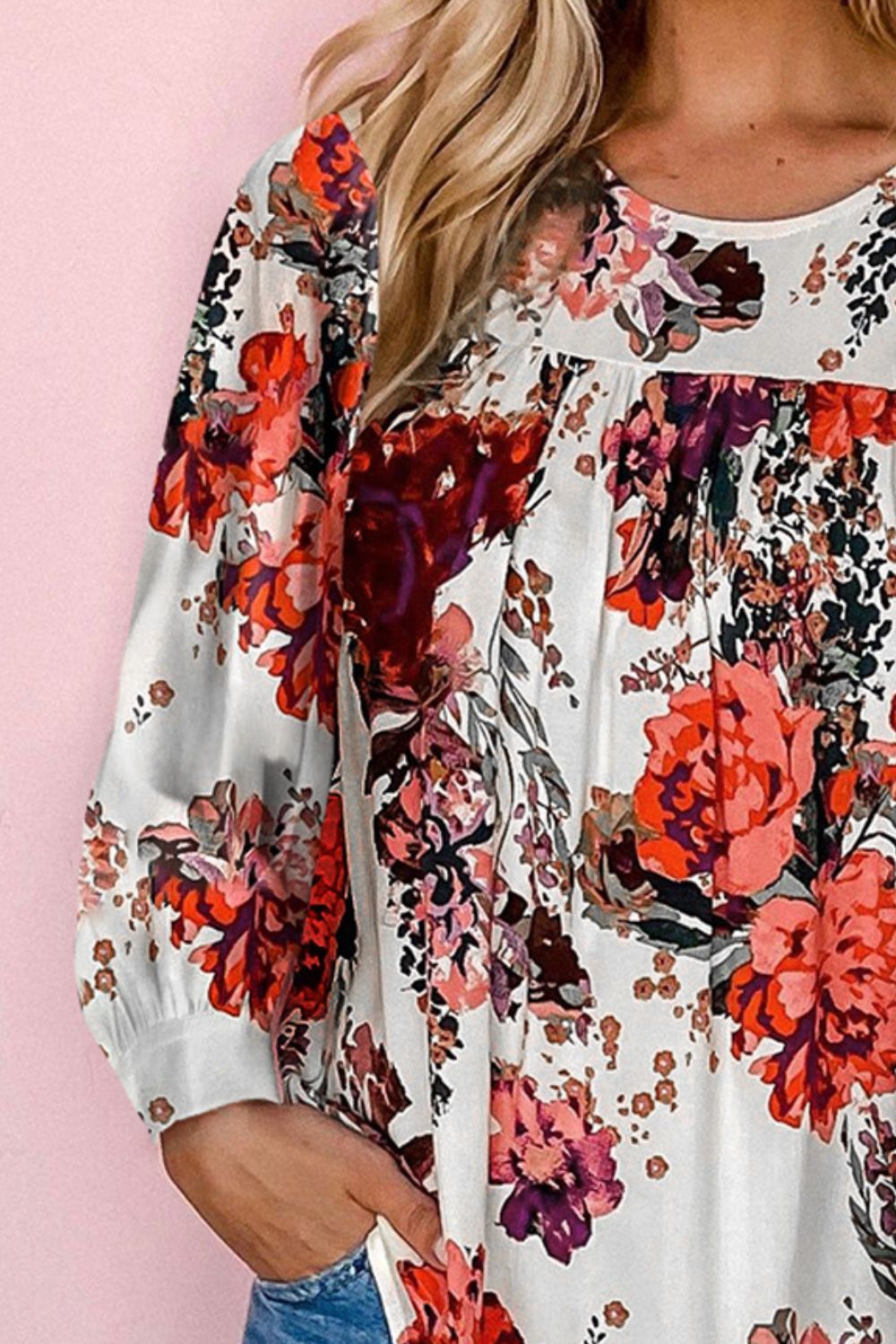 Blusa de manga larga con cuello redondo y estampado floral