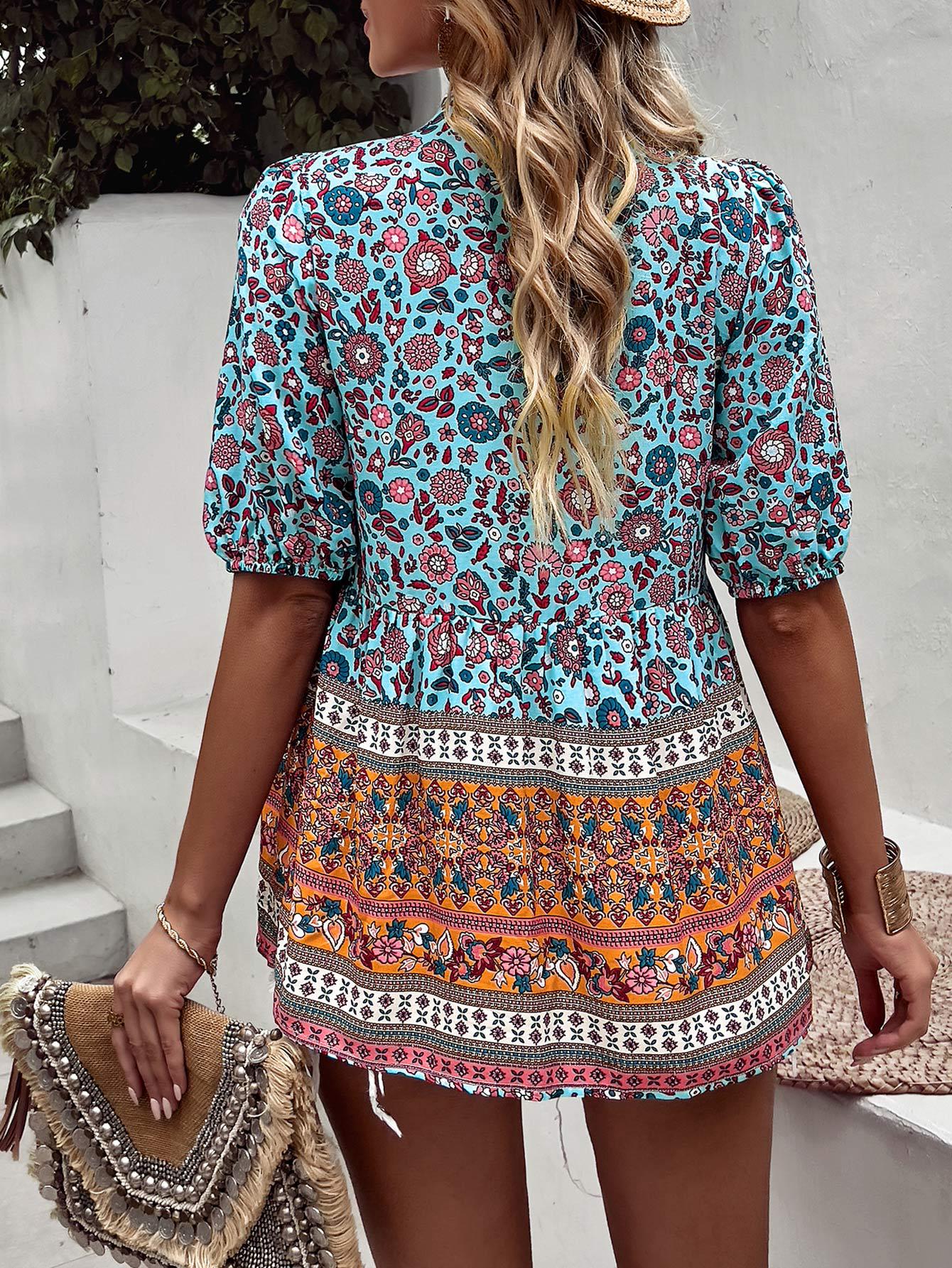 Blusa babydoll con mangas abullonadas y lazo con borlas bohemias