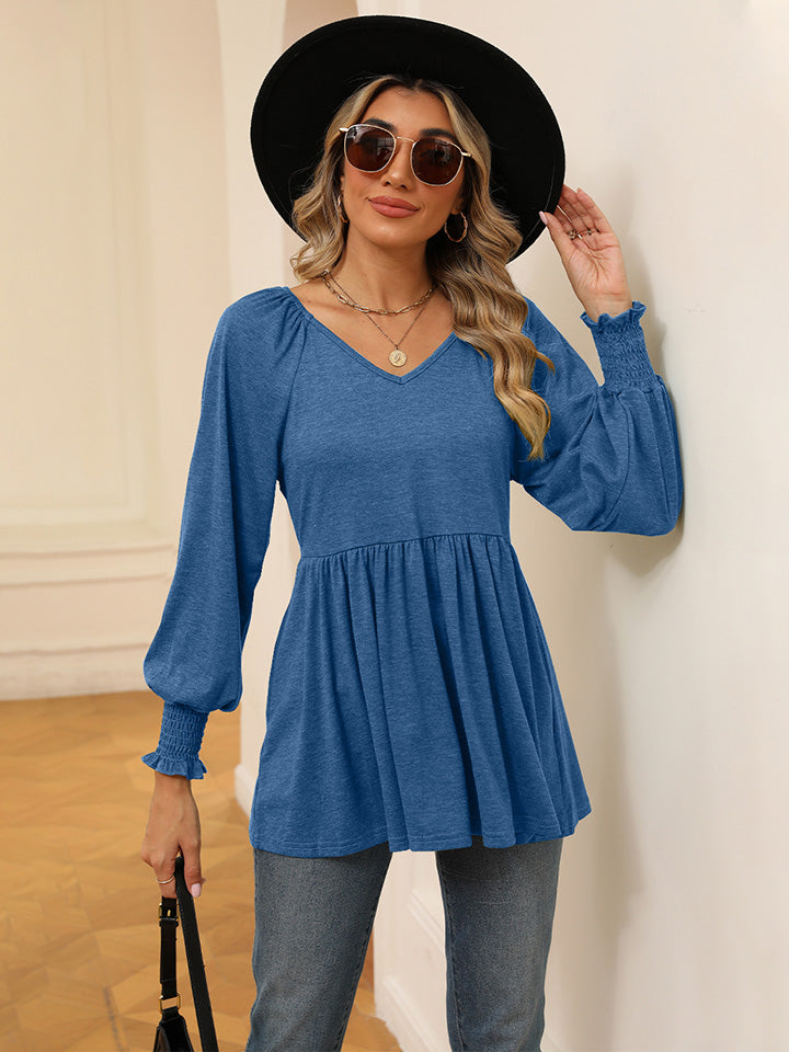 Blusa con mangas farol y cuello en V