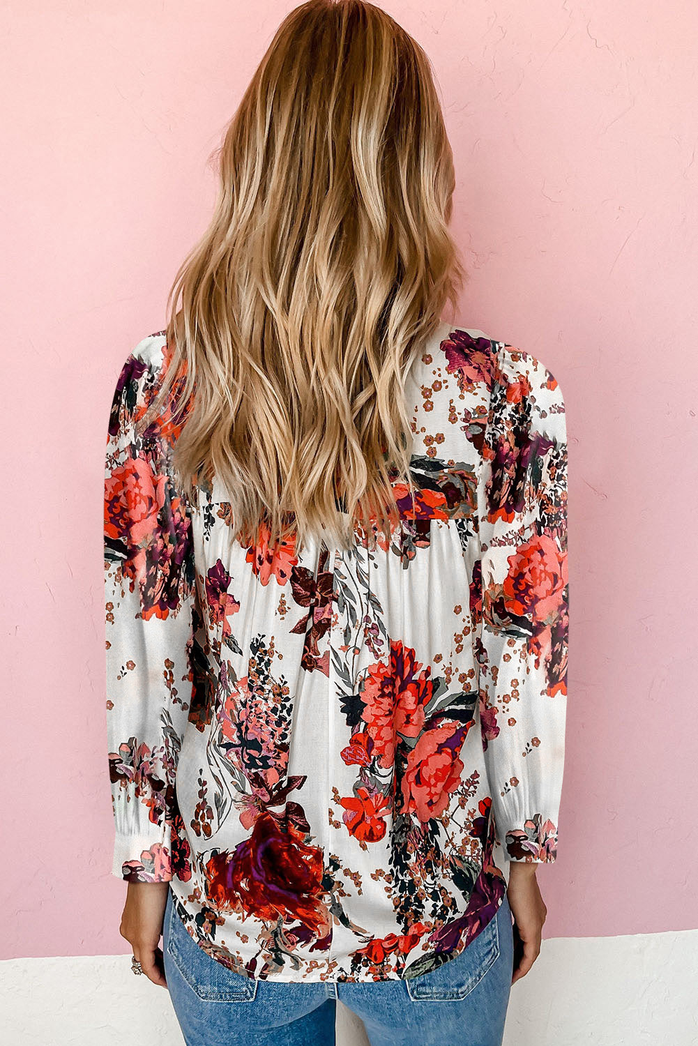 Blusa de manga larga con cuello redondo y estampado floral