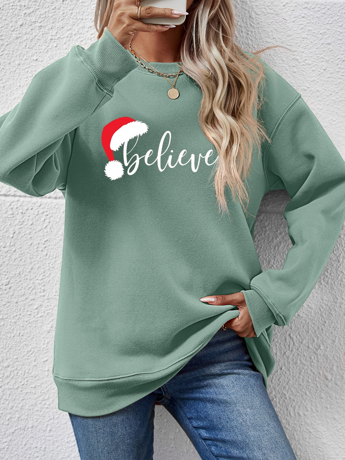 Sudadera de manga larga con gráfico BELIEVE