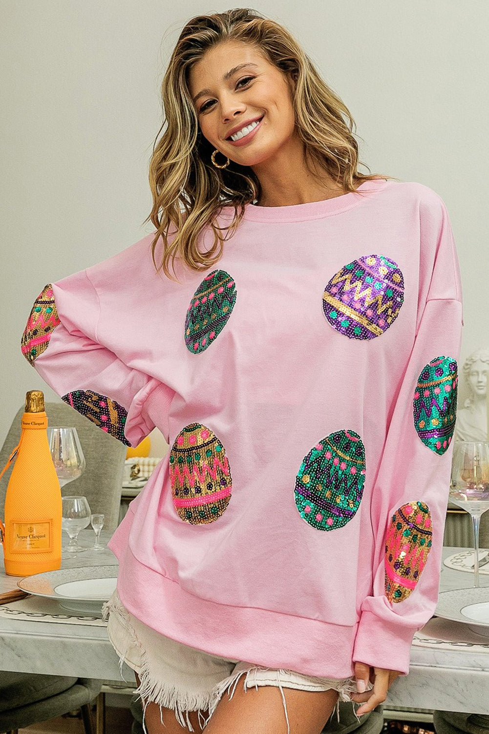 Sudadera extragrande con hombros caídos y huevos de Pascua con lentejuelas rosa