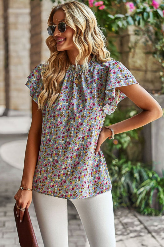 Blusa floral con cuello redondo y manga acampanada