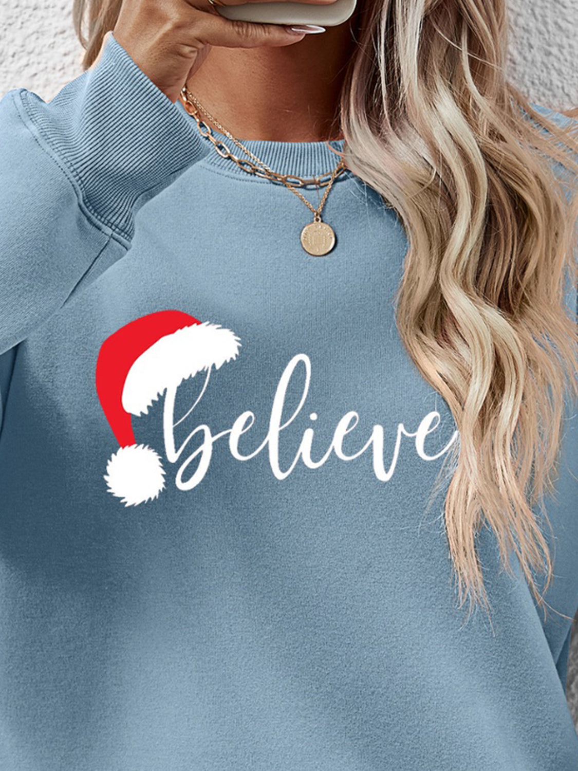 Sudadera de manga larga con gráfico BELIEVE