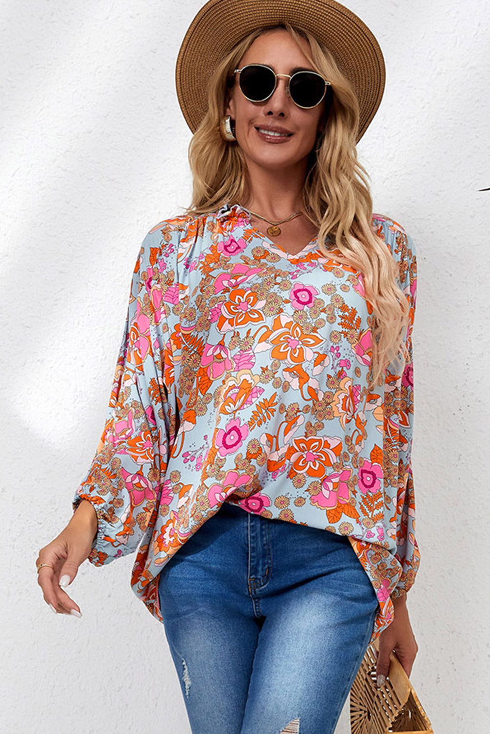 Blusa holgada con cuello en V y pliegues con estampado floral azul cielo