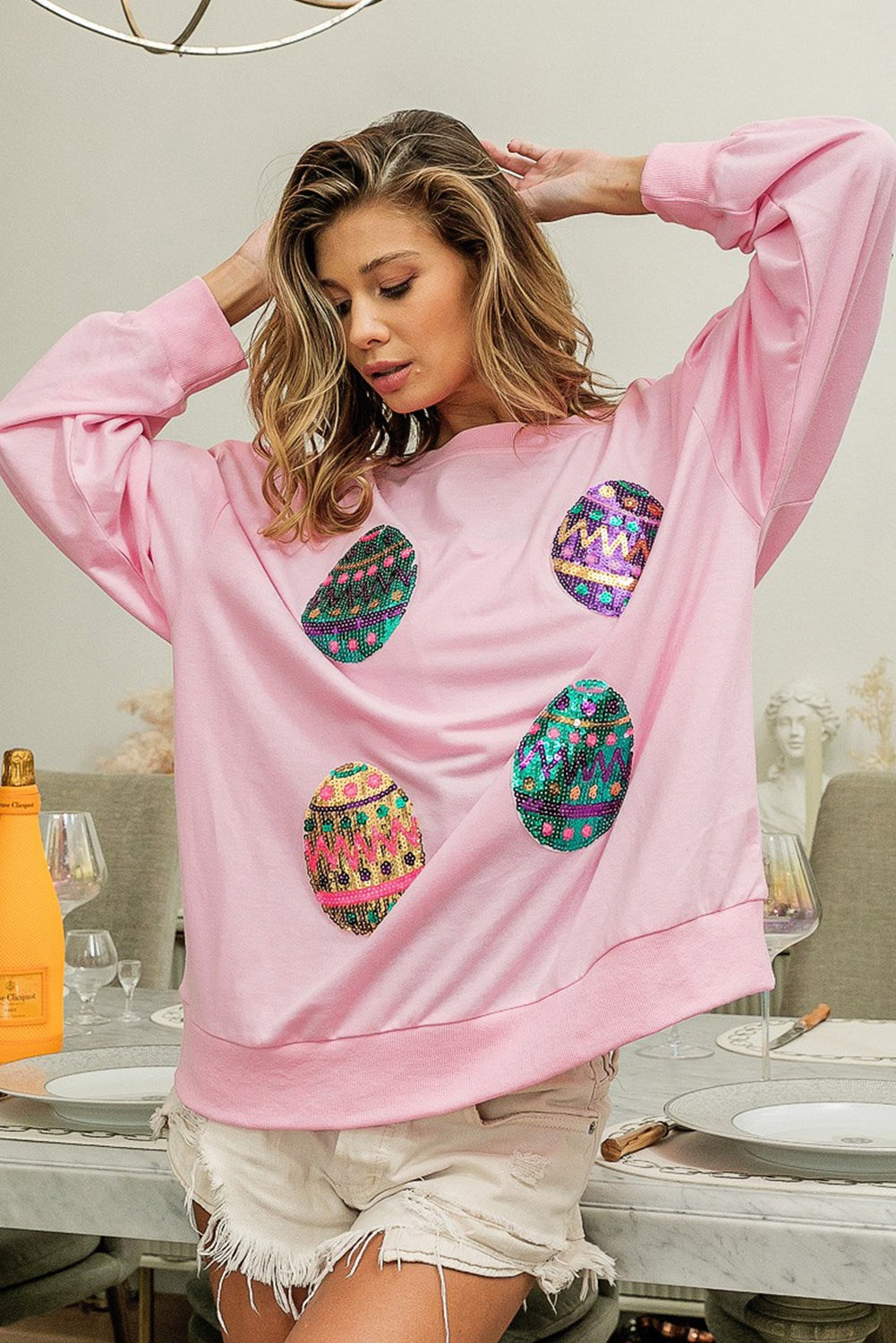 Sudadera extragrande con hombros caídos y huevos de Pascua con lentejuelas rosa