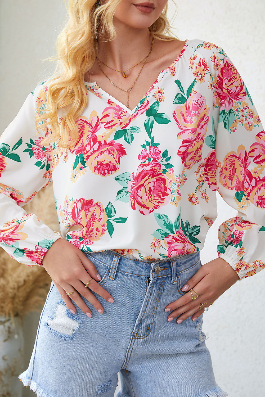 Blusa de manga larga con cuello con muescas y estampado floral de Double Take