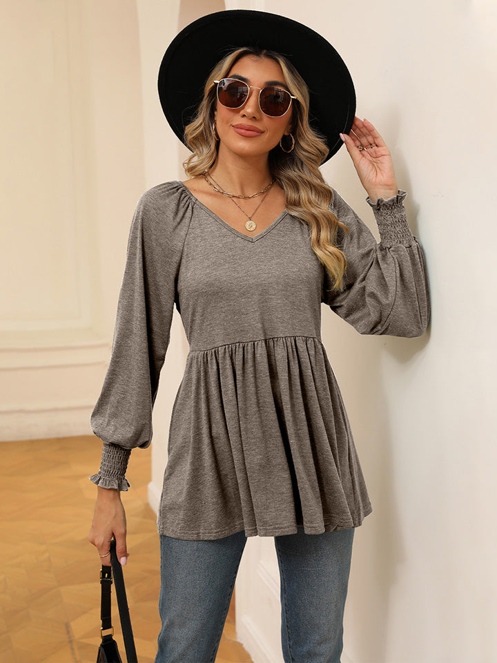 Blusa con mangas farol y cuello en V