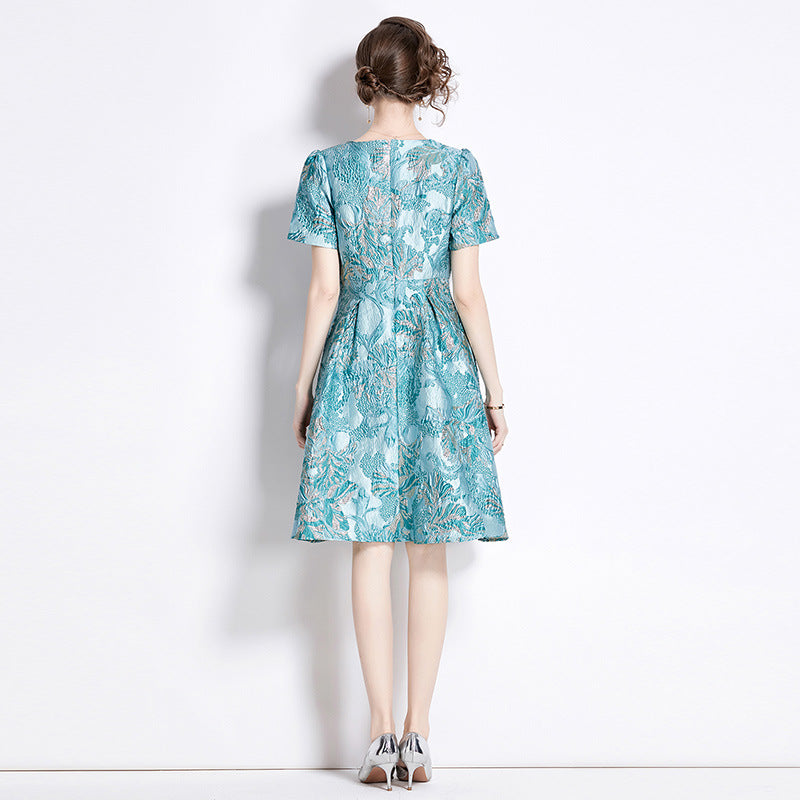 Robe élégante en jacquard de couleur à taille fine