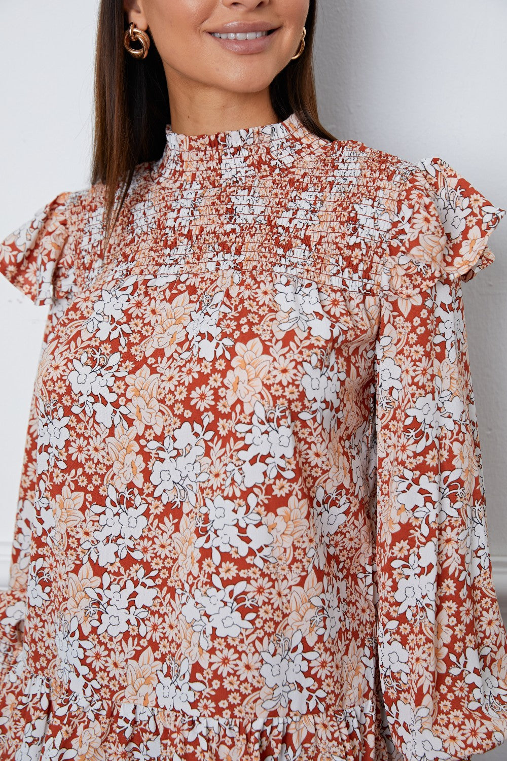 Blusa con volantes y mangas farol fruncidas con estampado floral