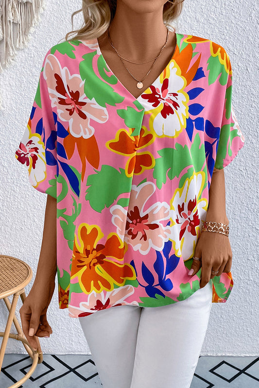 Blusa de manga raglán corta con cuello en V y estampado floral