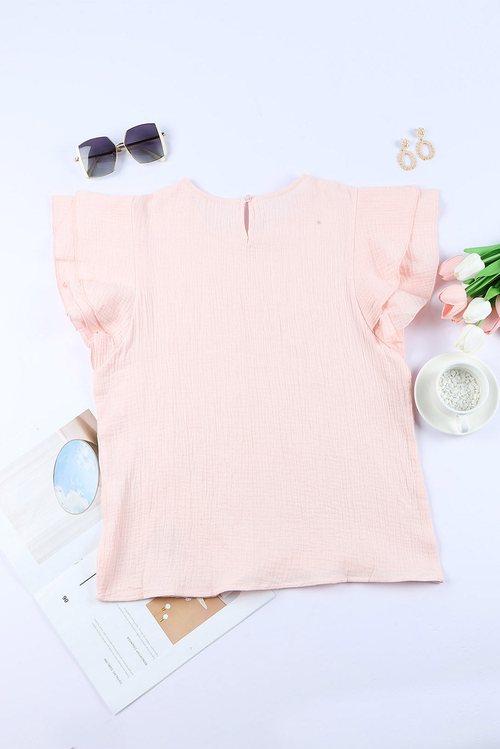 Blusa de manga corta con volantes escalonados y textura rosa