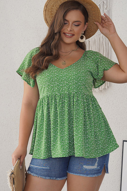 Blusa peplum con mangas acampanadas y estampado floral de florecitas