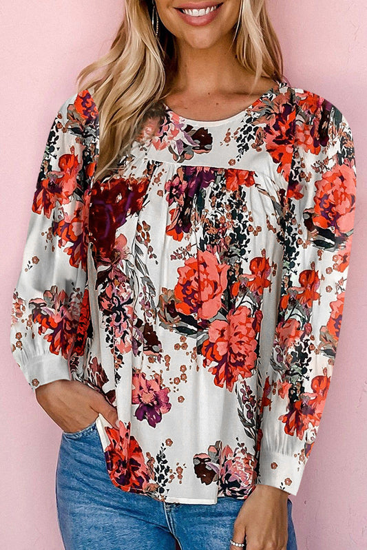 Blusa de manga larga con cuello redondo y estampado floral