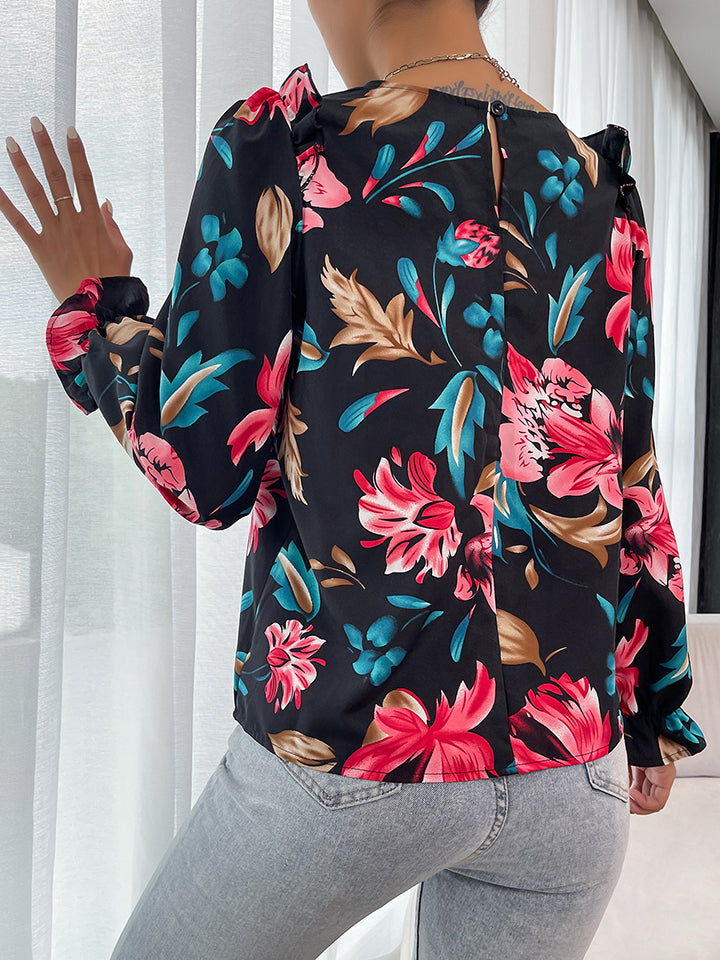 Blusa con volantes y hombros descubiertos con estampado floral