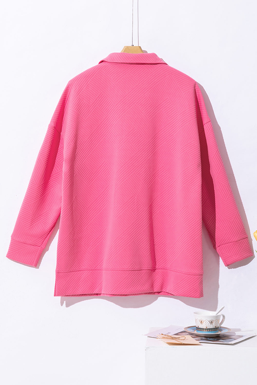 Sweat-shirt texturé rose vif à encolure zippée et poche kangourou