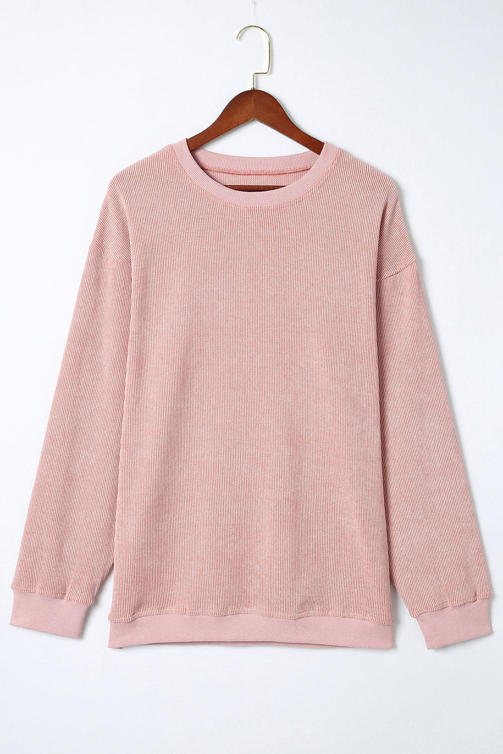 Sweat-shirt rose uni en tricot côtelé à col rond