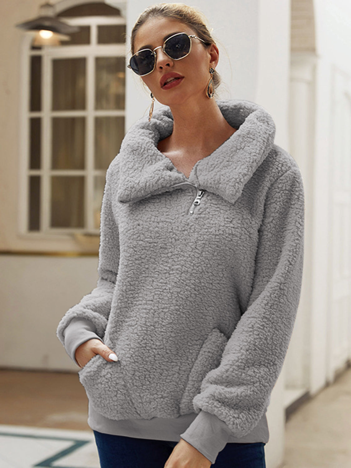 Sudadera con cuello y detalle de cremallera