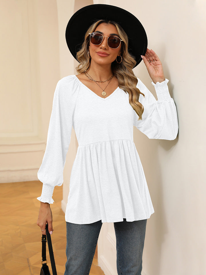 Blusa con mangas farol y cuello en V