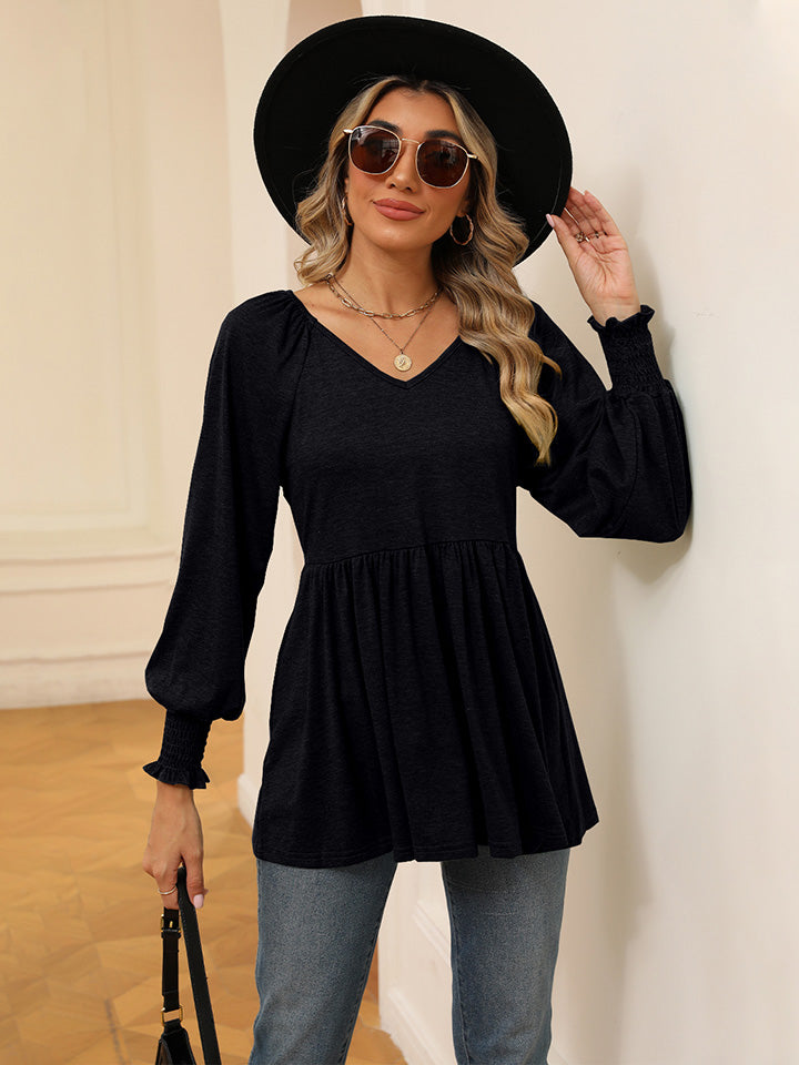 Blusa con mangas farol y cuello en V