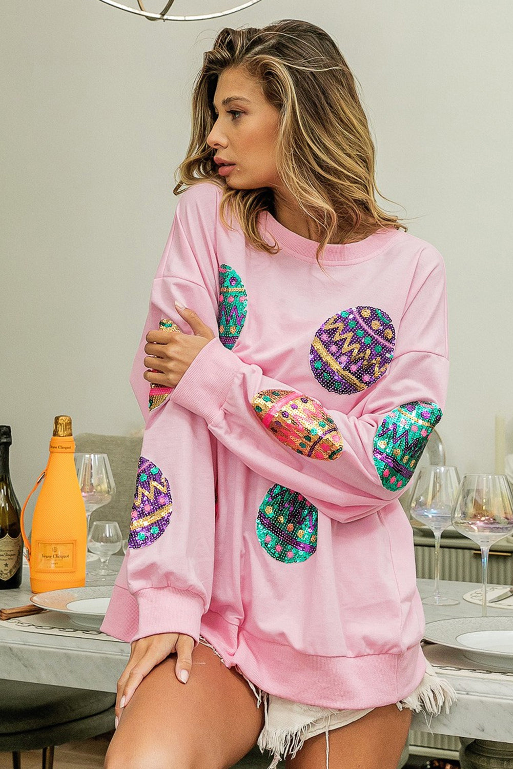 Sudadera extragrande con hombros caídos y huevos de Pascua con lentejuelas rosa