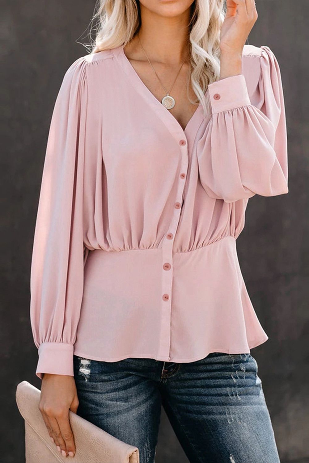 Blusa con mangas abullonadas y botones