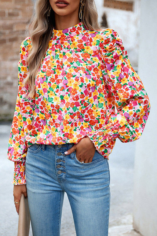 Blusa floral con mangas farol fruncidas