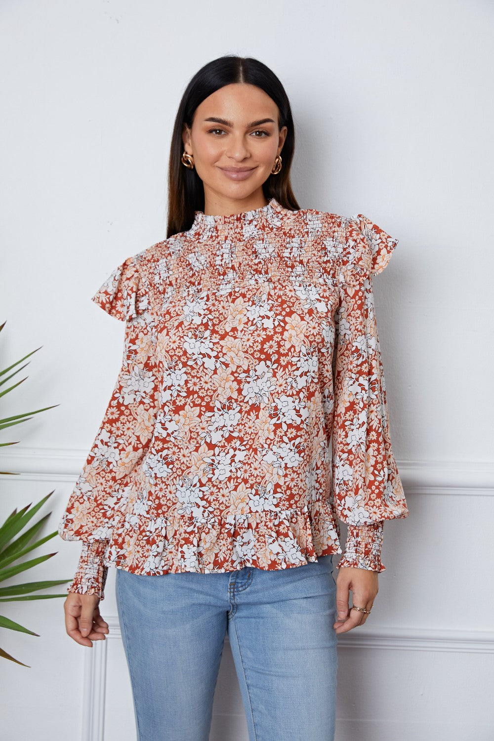 Blusa con volantes y mangas farol fruncidas con estampado floral