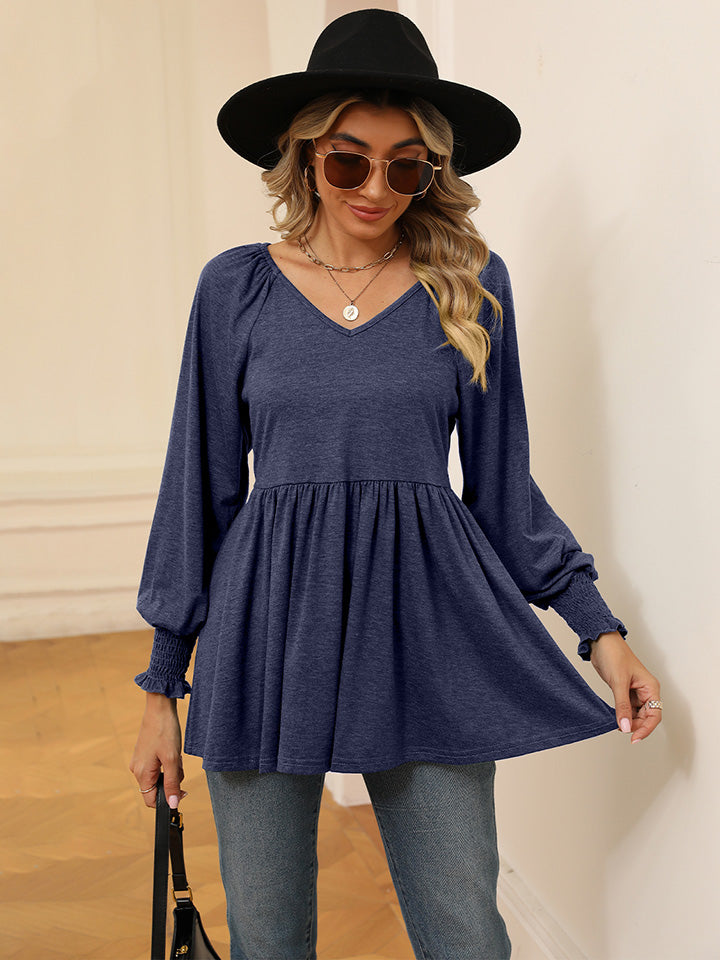 Blusa con mangas farol y cuello en V