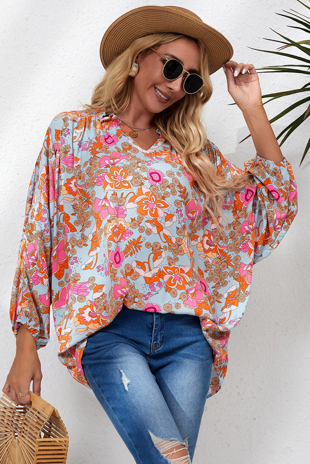 Blusa holgada con cuello en V y pliegues con estampado floral azul cielo