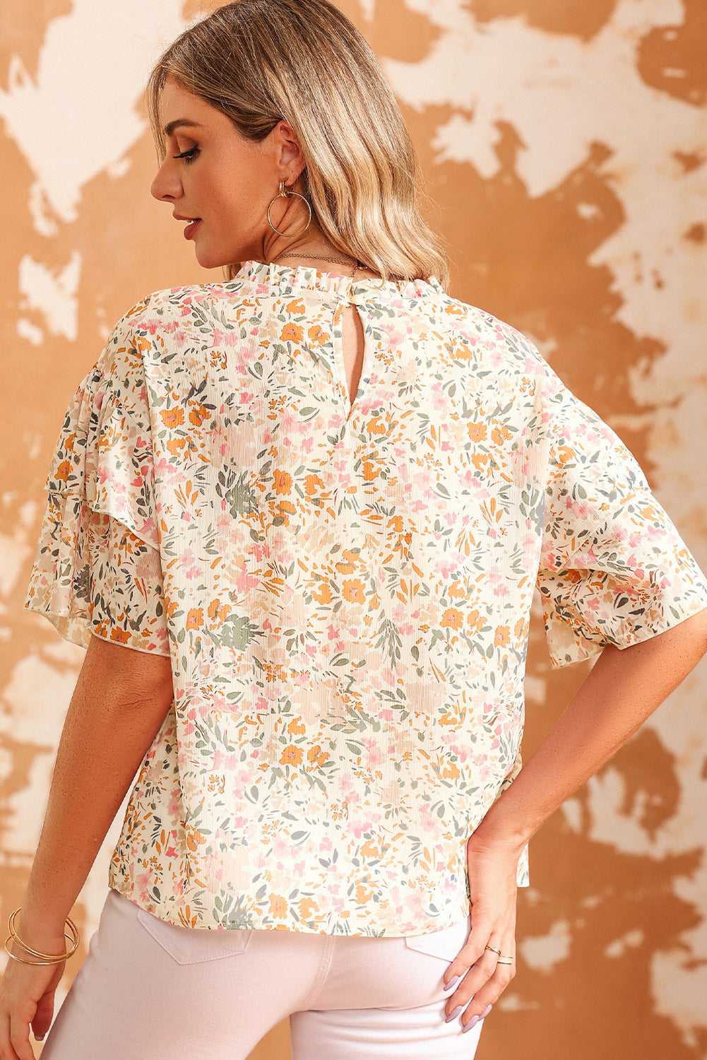 Blusa con mangas anchas y volantes con estampado floral multicolor