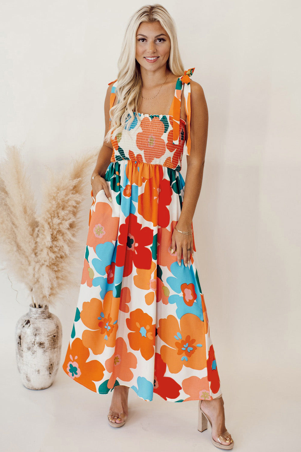 Vestido largo con tirantes florales y busto ahumado naranja