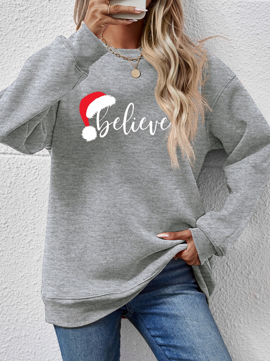 Sudadera de manga larga con gráfico BELIEVE