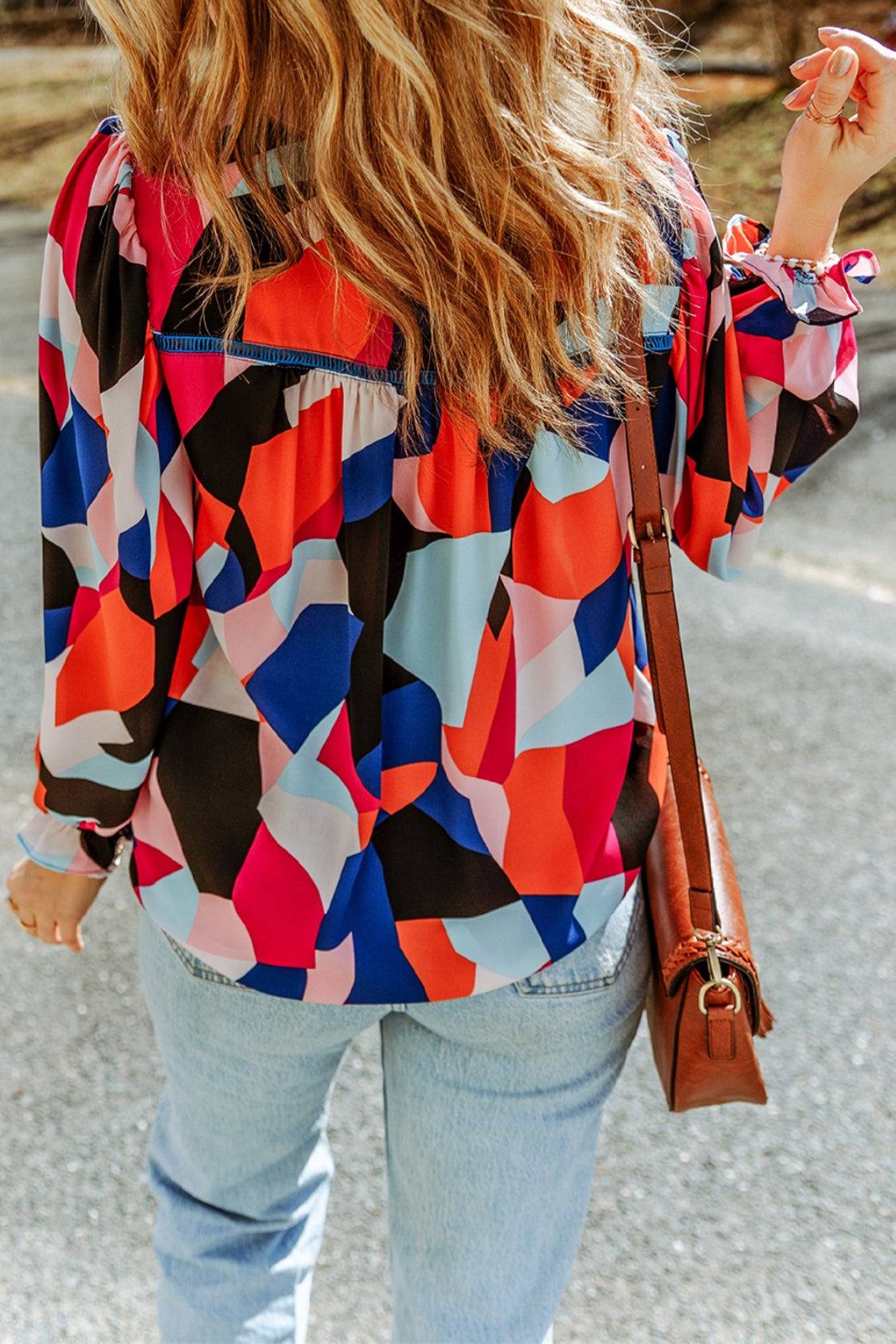 Blouse à manches bouffantes et à volants à col rond et motif abstrait